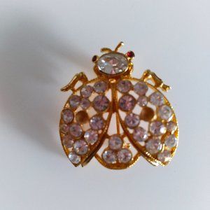 Vintage rhinestone flying ladybug brooch